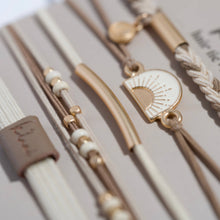 Load image into Gallery viewer, K'lani hair tie bracelets - "Rise" Cream and Tan With Gold & Sun Accents Hair Tie Bracelets
