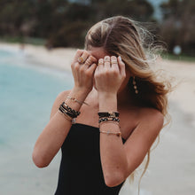 Load image into Gallery viewer, K'lani hair tie bracelets - "Connect" Black &amp; Cream with Gold Accent Hair Tie Bracelets
