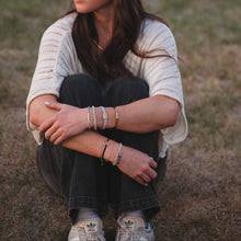 Load image into Gallery viewer, K'lani hair tie bracelets - "Flirt" Polka Dot in Cream &amp; Black with Green Accent Hair Tie Bracelets
