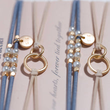 Load image into Gallery viewer, K'lani hair tie bracelets - "Sisters" Gold &amp; Pearl Shareable Hair Tie Bracelet Set
