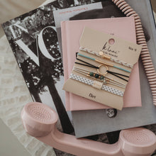 Load image into Gallery viewer, K'lani hair tie bracelets - "Flirt" Polka Dot in Cream &amp; Black with Green Accent Hair Tie Bracelets
