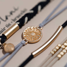 Load image into Gallery viewer, K'lani hair tie bracelets - "Inspire" Grey &amp; Black with Gold Flower Accent Hair Tie Bracelets
